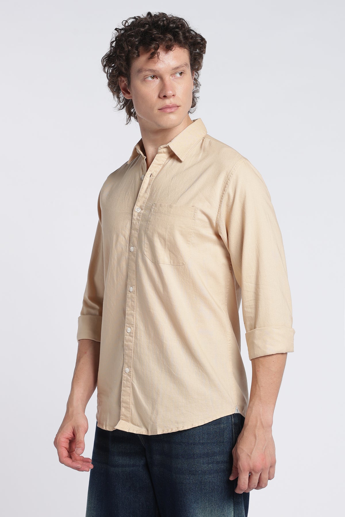 Back view of men's light brown Oxford shirt